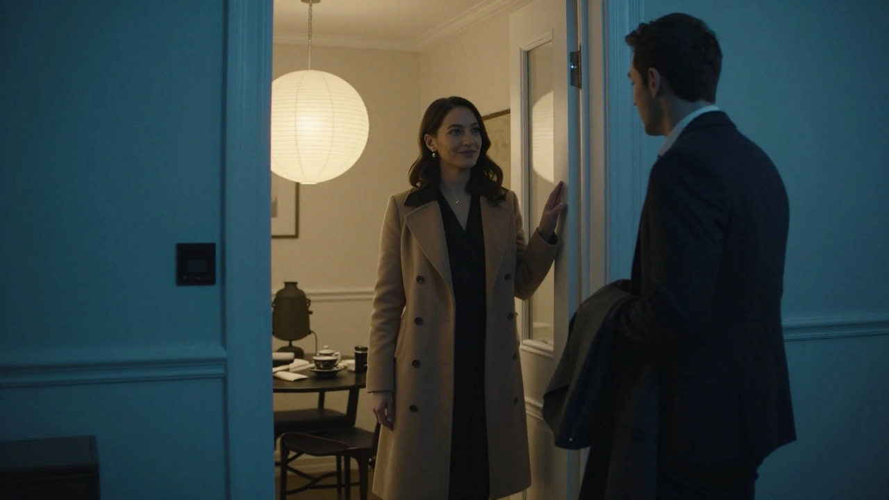 A man hesitating at a apartment door, greeted by a woman in a coat, soft lantern light inside.