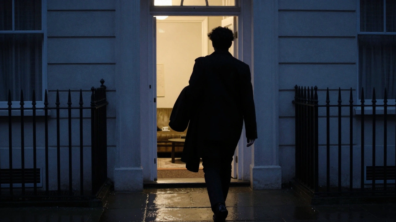 A person walking away from a warmly lit doorway into a rainy London street, looking at peace.