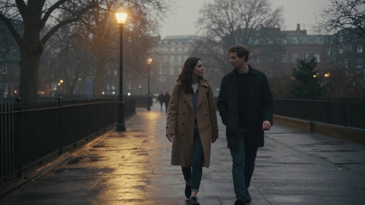 Two people walking together in a misty London park at dusk, sharing a peaceful companionship.